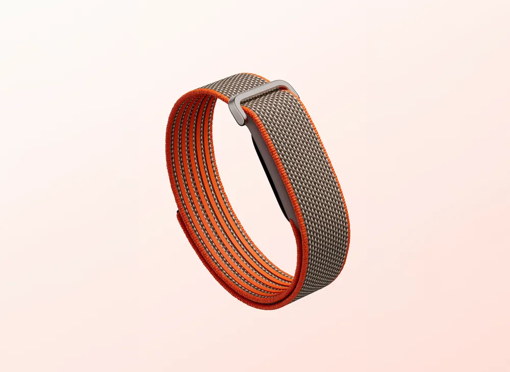 Fitbit Air 柯瑞特別版採橘色與棕色的搭配設計